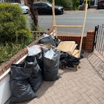 6 waste bags and wooden pallet Minor builders waste, cardboard, bits of copper pipe, cardboard boxes and wooden pallet IG9 - removed for £117