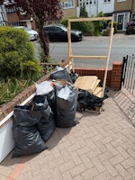 6 waste bags and wooden pallet collected by The Mess Man ltd