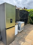three fridges one fridge freezer, one small fridge and one small freezer LU6 - removed for £208