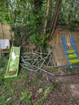 trampoline parts, slide & wood A dismantled trampoline, kids slide a table and some wood from a shed. Some general garden waste UB1 - removed for £117