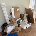 Bags/boxes of rubbish/chair Just some left over boxes and bags from a house move SW19 - removed for £94