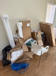 Bags/boxes of rubbish/chair Just some left over boxes and bags from a house move SW19 - removed for £94