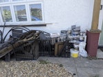 Mixed Wood, metal, electrical Collect from out front. 
Metal- fire pit, table frame, fireguards
Wood- shelving, table top, garden wood
Electric- Two small monitors, roomba
Tiles and flooring, some still in packaging could be reused
Leave hazardous SG14 - removed for £221