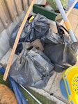 shed, astroturf, bagged rubble Waste includes shed (dismantled and chopped into manageable pieces) several rolls of Astro turf of varying size (including turf down in pictures - will be cut and rolled up prior to collection) and 3 bags of rubble/heavy waste. Stored in back garden & access via gate (back road is accessible for parking) LS18 - removed for £300