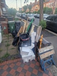 insulation, wood & plasterboar off cuts if insulation, wood sheet materials and some plasterboard.. there is also a fee hosuehold items.

all light and loose items are in bags. E17 - removed for £130