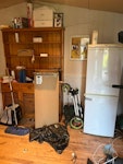 Contents of large summer house Various pieces of furniture (pine dresser, coffee table, small chest of drawers, large desk), large running machine and assorted items of waste. Plus fridge if possible. New photos added to show emptier shed after multiple tip runs. Previous collector had to back out because of broken down van. Needs to be cleared before 2/6/26 (next tuesday) when shed is being ripped down. RH16 - removed for £364