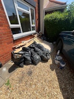 15 bags, offcuts wood, debris collected by Inter County Service Group LTD