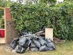 Masonry, cement, bricks, wood masonry, cement. Bricks, wood and garden  waste. E1 - removed for £280