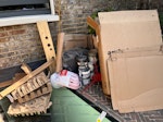 misc metal, card, electronics misc cardboard boxes, wood plank, mixed metal and a bag of electronic waste N1 - removed for £104
