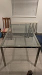 Large glass top dining table Large dining table with glass top. 160 cm (l) x 90 cm (w) x 72 cm (h). Glass thickness: 12mm

One of the table attachments has come away from the table top, but still fixed to the frame. See pics for details. Glass top is heavy, will need 2 people to move. BN3 - removed for £39
