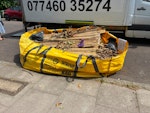 Bag ofwood garden waste chairs Collection of a 1.5tn HIPPOSKIP bag of garden waste (weeds, leaves, dead plants), waste wood, two plastic chairs SE4 - removed for £195