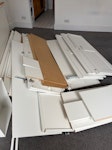 wardrobes and bookcase Two ikea wardrobes and a book case that needs removing from a vacated flat. About two meters in length. About 8 panels and 6 doors. N1 - removed for £180