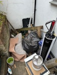 household rubbish and wood Fan, play mat, wood planks, vacuum, small shelf, cardboard N5 - removed for £94