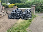 Approx 75 bags of soil/grass The grass and soil has been dug up to create a path. It’s quite sandy soil TW9 - removed for £175