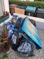 Pallet, door, 20x bags waste collected by The Mess Man ltd