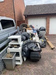 General household waste Clothes , door , furniture lawn mower chest freezer B90 - removed for £175