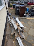 Planks, bags, cardboard, waste Planks of wood plied on top of each other. Be careful when picking up theres nails on them. Black bin bags with smaller wood and additional waste. Cardboard boxes and big TV one. Additional rubbish which are not that big. SW16 - removed for £130