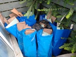 8x 30l bags of DIY rubbish Water damaged laminate floor boards with foam underlay. There are some wooden skirting as well, also water damaged HP13 - removed for £110