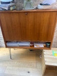 Cocktail cabinet and armchair Cocktail cabinet - missing one leg
Armchair with v ripped upholstery SE13 - removed for £94