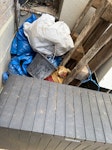 Garden waste ~30 half full rubble sacks of soil, and a few other items, pallet, plastic box, sand E8 - removed for £156