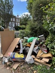 Pile of rubbish Pile of rubbish as shown in photos (mostly wood, old carpet and underlay, an old basin, an old blind) N1 - removed for £130