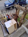Garden waste & cabinets 2 broken pallets (with rotten wood in bags), 2 small kitchen cabinets, kitchen bin & garden waste BN1 - removed for £41