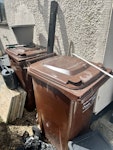 Garden & Home Waste Wheely Bins x2 (note that bins are full of mixed garden waste), Wheelbarrow & soil in wheelbarrow, soil in black bags, radiator, chair, concrete tiles. Quick access through side gate. SS7 - removed for £156