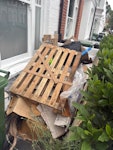 some bags , the rest all lose rubbish from a bathroom refurbishment , tiles , 1 x sink , 1 x toilet and some plywood . SW6 - removed for £184
