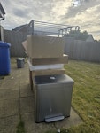 Cardboard Boxes & Misc Contains
- Contains cardboard boxes, some with polystyrene foam
- Misc broken PC parts
- Shoe rack
- Indoor bin BB2 - removed for £156