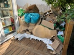 Cardboard & 3 beanbags Mostly cardboard packaging, with some polystyrene packaging and around 3 old beanbags. Neatly stacked in the garden by the fence. Very easy access from the public passageway over the fence, so short carry to the van. SE9 - removed for £104