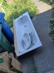 Bath & Chairs 1 x bath 170cm metal, 1 x bath panel, 1 x basin and tap, 2 x garden chairs  and some cardboard - in front garden SE16 - removed for £83
