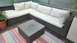Rattan Corner Sofa & Table Two rattan sofas with cushions. Each measures 200CM x 90CM; 90CM deep. Also square rattan table (70CM x 70CM) with glass top. Will only consider quotes including removal from top floor deck to street (stairs). NW2 - removed for £130