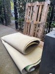 Carpet and wooden pallet 1 bedroom carpet (rolled), 1 wooden pallet and a few small wooden boards. All items are already outside the property. Ground floor with easy access. W4 - removed for £71