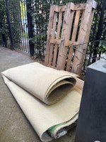 Carpet and wooden pallet collected by Riff Raff Rubbish