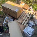 mixed waste mixed cardboard (empty) boxes, a timber pallet & other house hold stuff TW9 - removed for £130