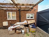 cardboard boxes and some junk collected by Pat Smith Environmental Ltd
