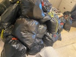 60 black rubbis bags & other 60 black bags of house hold rubbish broken toys. car seat, push chair, 1 medium suitcase 1 small. other random stuff in picture. HA1 - removed for £271