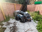 bags of rubbish and armchair bags of general rubbish and clothes plus old arm chair in pieces SE26 - removed for £104