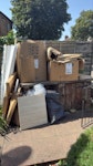 cardboard wood cardboard, wooden offcuts, flooring N13 - removed for £156
