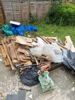 Bags of rubble and timber collected by Universal N&D LTD