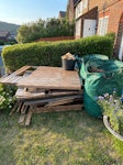Shed and garden waste All in front garden. 12 by 8 dismantled summer house (glass panels separate) plus garden waste in bags see photos BN2 - removed for £243
