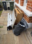 bits and bobs 2 large drawers, 1 table top, 2 medium lengths of guttering, 2 rubbish bags, 1 very small step ladder, metal pot with some pebbles in it SW4 - removed for £71