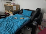 2 seater sofa bed with mattres A leather 2 seater sofa bed in good condition. Needs moving on as relocating. Fire label attached RH2 - removed for £78
