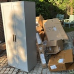 cardboard boxes and a wardrobe boxes with some styrofoam and a wooden wardrobe SW15 - removed for £130