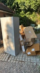 cardboard boxes and a wardrobe boxes with some styrofoam and a wooden wardrobe SW15 - removed for £130