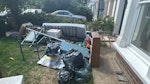 Furniture,boxes,junk+radiator Bathroom radiator, bed frame, 2 desks, mattress and topper, empty cardboard boxes, small bookshelf, rubbish bags, bags of rubble/slate/earth, 2 old sinks with a few bricks on the side. E7 - removed for £286