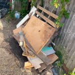 Mixed wood, old doors, ladder, Collection of mixed waste including wooden planks, old shelving, cabinet doors, a ladder, insulation material and several bags of household rubbish. Everything is already outside with easy access. NW9 - removed for £130