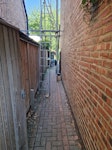 Solar install waste There is a wooden pallet, boxes and other solar install rubbish out in front, and on the side of the house there is a spare solar panel, a box of bits and pieces, and DC cable inside the gate. TW12 - removed for £100