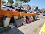 miscellaneous rubbish bed base miscellaneous house rubbish, cardboard, bed base and broken thin boards which made up furniture, old baby items in not reusable condition, plastic containers etc B34 - removed for £280