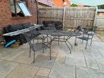 2 sofas & table and chairs 2 leather sofas been outdoors for 5 years + garden metal table and chairs B94 - removed for £343